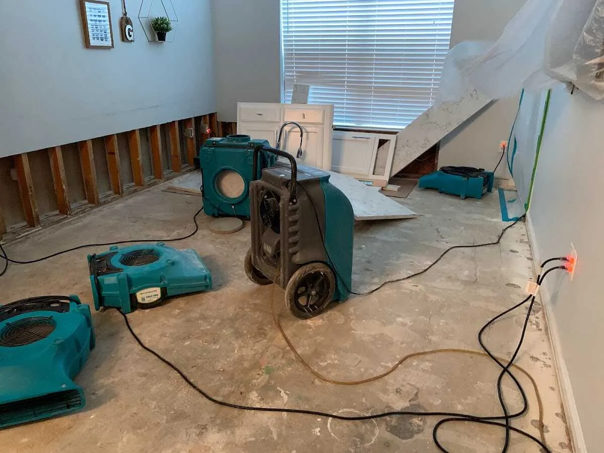 Dehumidifier in flood-cut room for Water Damage Restoration in Vancleave